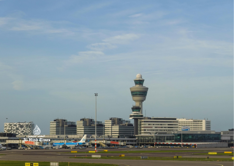 Air traffic control tower managing international airport flight operations