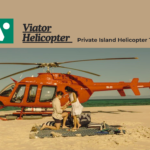 Luxury helicopter flying above a tropical private island with crystal clear ocean views