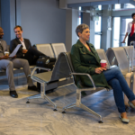 Premium lounge inside Dubai International Airport Terminal with luxury seating, dining area and passenger facilities.