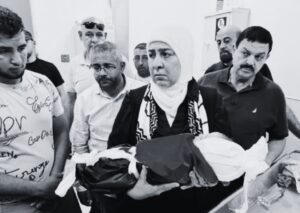 Family grieving after the death of a three-month-old baby during the Gaza conflict following reported difficulties reaching medical care.