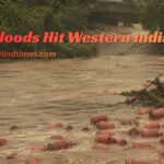 Floodwaters carrying away hundreds of LPG gas cylinders during severe flooding in western India.