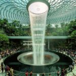 Singapore Changi Airport featuring Jewel Changi indoor waterfall and world-class aviation attractions.