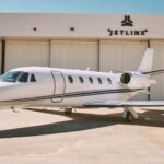 Jet Linx Aviation private business jet on the airport apron before departure.