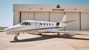 Jet Linx Aviation private business jet on the airport apron before departure.